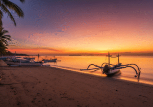 Matahari terbenam di Pantai Lawata, Kota Bima dengan perahu nelayan.